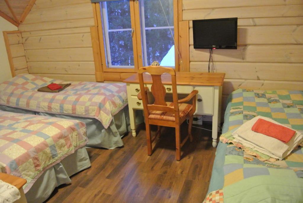 Guest House Haapaniemen Hirsikartano Iisalmi Bilik gambar